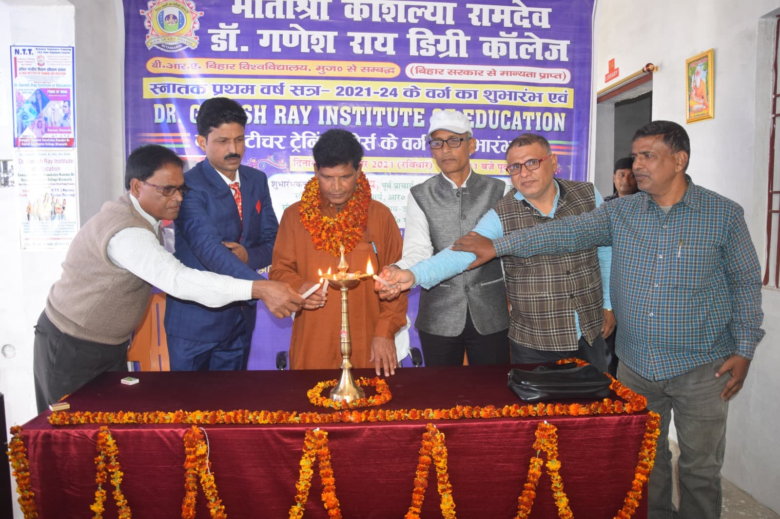 Respected Secretary Dr. Ganesh Rai, Principal Dr. Arvind Kumar, and the faculty members lighting the ceremonial lamp to mark the auspicious commencement of the class proceedings.